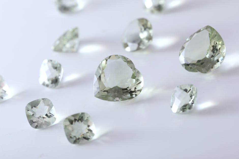 Close-up macro of a faceted peridot gemstone showing the olive green color, natural light